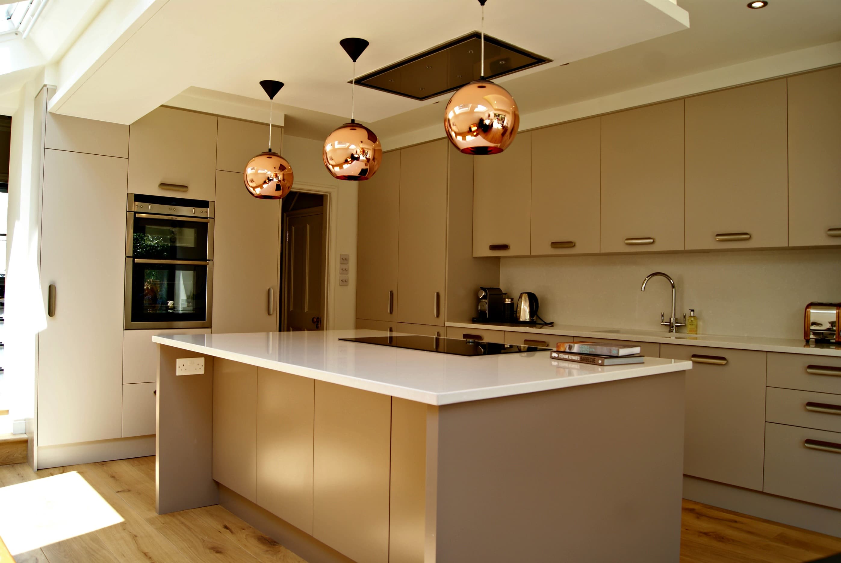 Haier Kitchen — handmade bespoke kitchen in taupe and brass